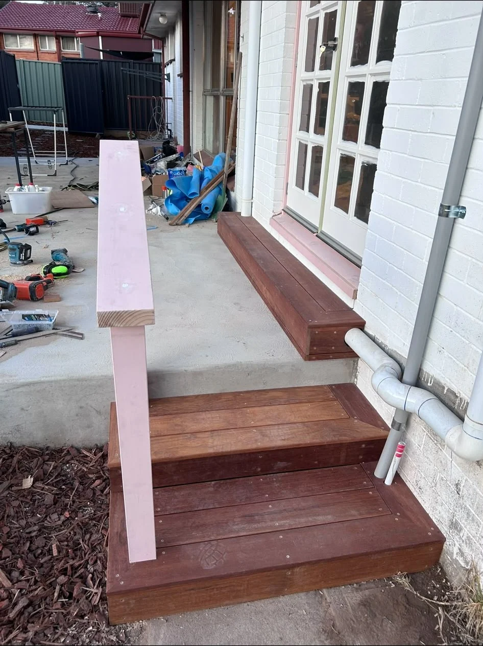 Merbau stair and deck build with stained handrail